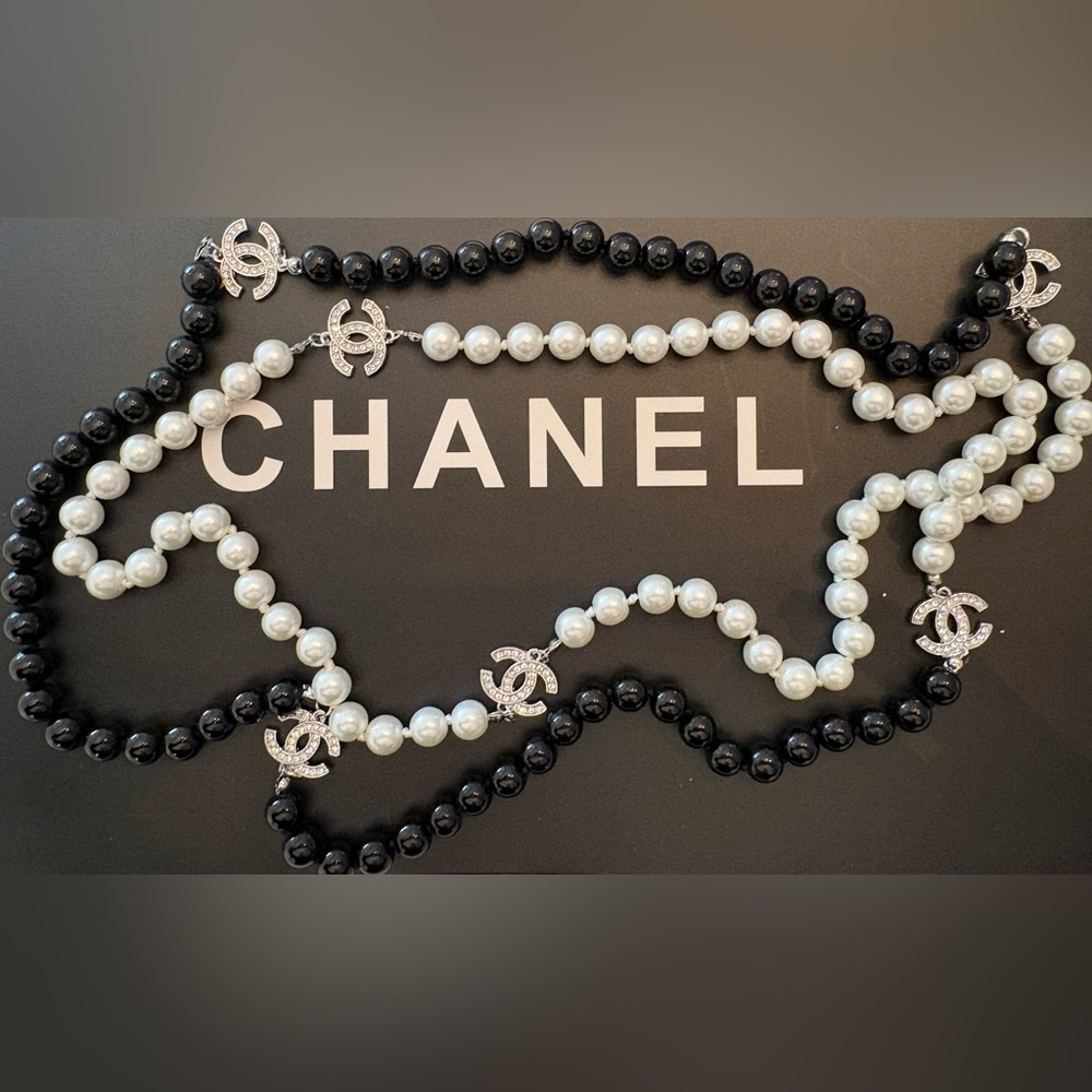 Black Beaded & Pearl Necklace at 24 inches with Silver diamond Logo Charms